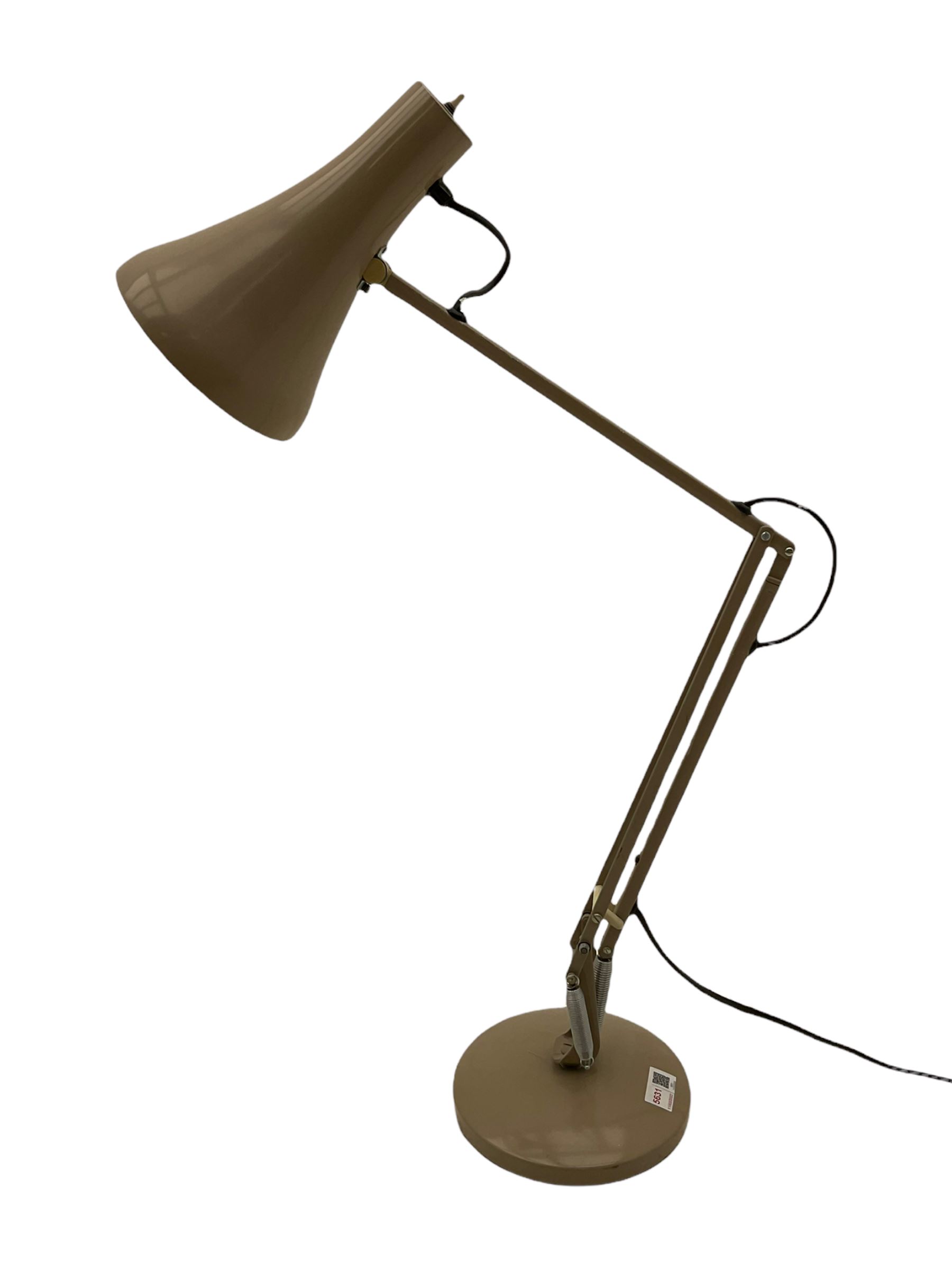 Angle-poise lamp and an Islamic prayer mat