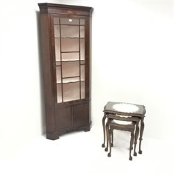 19th century inlaid mahogany floor standing corner display cabinet, single astragal glazed door enclosing three shaped shelves, two cupboard doors, bracket supports (W86cm, H195cm, D54cm) and a 20th century walnut nest of thee tables (2)  