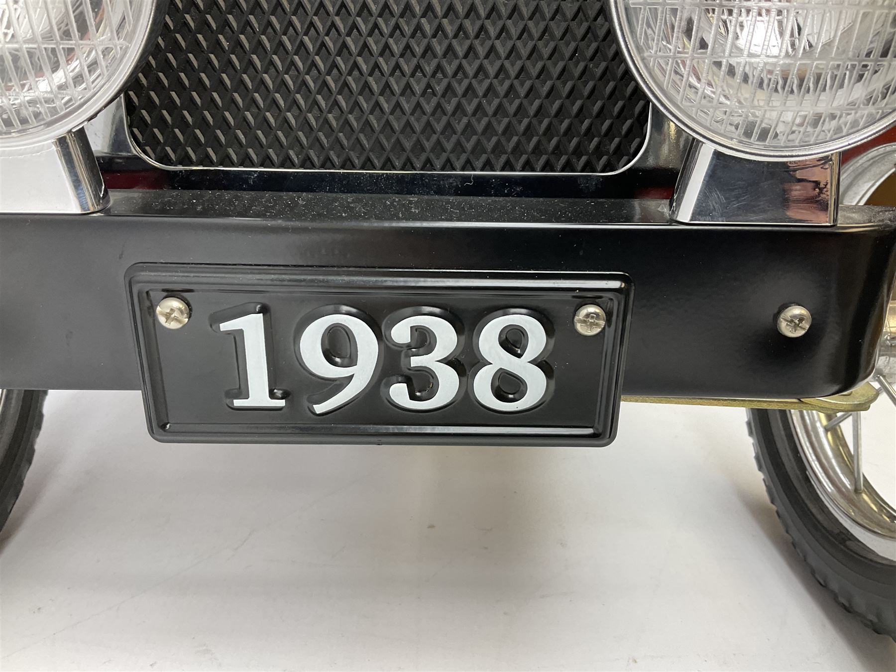 Red child's tin-plate pedal car with chrome detail, by Posh Paddles, Scarborough, H56cm, L80cm