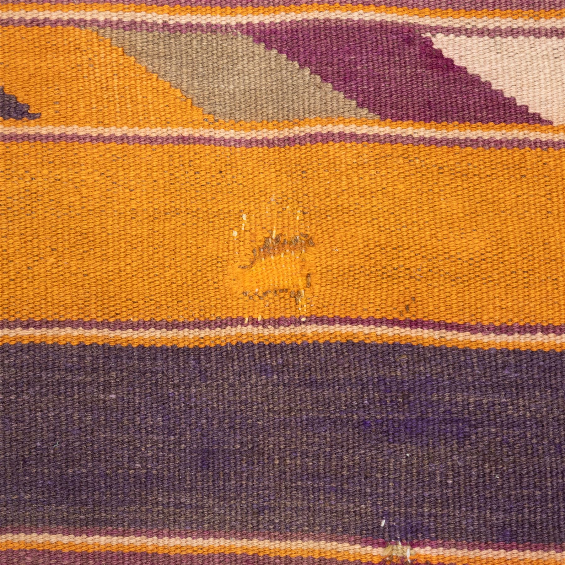 South West Persian Qashqai flatweave kilim, field decorated with bold horizontal bands in shades of aubergine, plum and orange, ochre, olive and lilac, interspersed with narrow registers of diagonal chevron motifs in cream and dark brown, framed by brown end panels, with fringe ends 