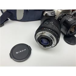 Four Minolta camera bodies, to include Dynax 500si, serial no. 94812651 with 'Signa Zoom 1;3.5-4.5 f=28-70mm' lens, Maxxum 300si, serial no. 97821665, with 'Tamron AF 80-210mm' lens and Dynax 300si, serial no 01603265'  with Minolta AF Power Zoom 35-80mm 1;4' lens, etc, together with Pantax MV1 camera bodies and other camera equipment 