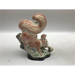 Six Rye Pottery figures, comprising, jumping fox, squirrel upon a branch, billy goat, bull, chicken and cockerel  