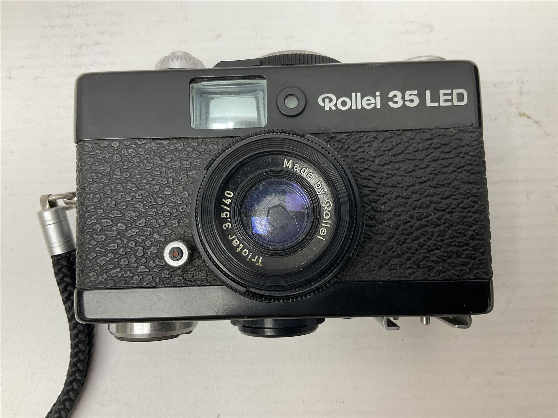 Three Rollei cameras, to include a Rollei 35 LED camera, with Triotar 3.5/40 lens and two Rollei XF 35 cameras, each with Sonnar 2.3/40 lenses