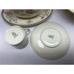 Minton Jasmine pattern tea and dinner wares, including dinner plates, sauce boats, side plates, bowls, teacups, coffee cans and twin handled soup bowls, etc (122)