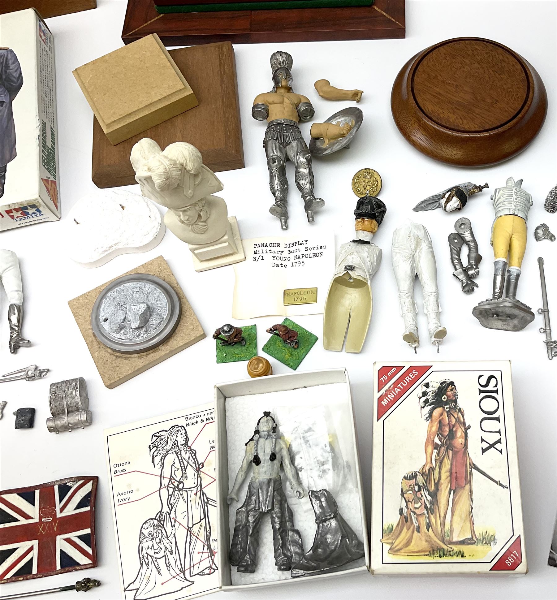 Quantity of cast metal figures and busts by Ceremonial Studios, Amati Miniatures etc including historical soldiers, American Native Indians etc predominantly in unmade/part constructed and unpainted kit form; together with associated accessories, wooden plinths etc; and boxed plastic soldiers