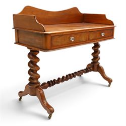 Victorian mahogany washstand with raised three-quarter back, fitted with two frieze drawers with glass handles, raised on spiral turned supports with splayed supports and castors united by barley-twist stretcher