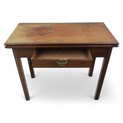 Georgian mahogany fold-over tea table, rectangular top with moulded edge over single frieze drawer with brass handle plate, on square tapering supports with gateleg