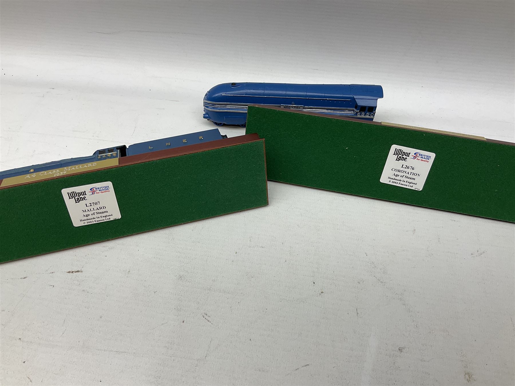 Lilliput Lane models to include 'Age of Steam' locomotives, comprising 'Coronation', 'Royal Sovereign', 'Mallard' and 'Flying Scotsman', together with limited edition 'Dawn of Steam' figure, all boxed, with various deeds, and further Lilliput Lane booklets and leaflets etc