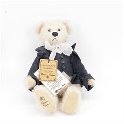 Two Robin Rive limited edition teddy bears, comprising 'Wordsworth', an ivory mohair bear with waistcoat and jacket limited edition no. 31/50 and 'Yehudi' , a yellow bear with violin limited edition no. 54/700, Wordsworth H33cm