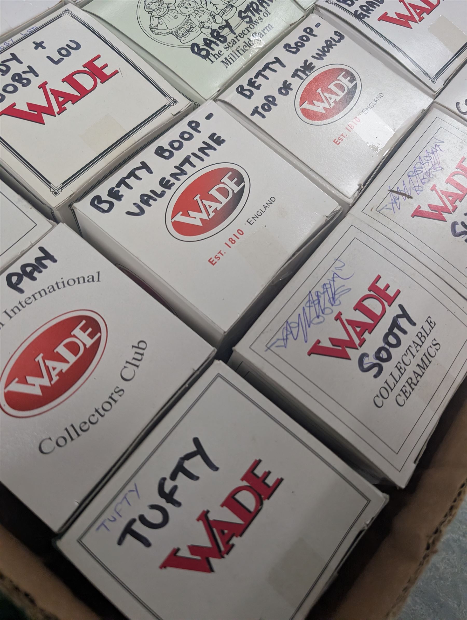 Collection of boxed Wade figures, including Betty Boop, Cinderella, Fairy Godmother, etc