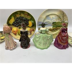 Four Frank Reynolds figures of ladies together with five plates painted by the same artist