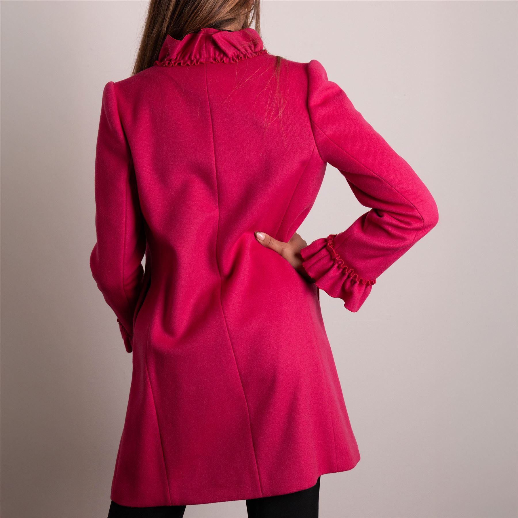 Gucci - wool ruffle-front single-breasted coat in bright fuchsia pink, with high ruffled collar, cascading ruffle trim to the front, collar and cuffs, faux pearl and gilt GG monogram logo button fastening, size 44, unused with the original garment bag and hanger