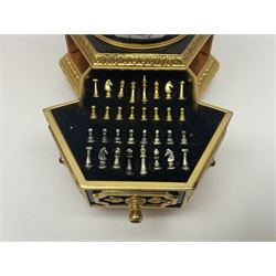 Franklin Mint House of Faberge; The Imperial Jeweled Egg Chess set, the egg opening to reveal a chess board, with a draw to the hexagonal base holding the miniature chess pieces, H23cm 