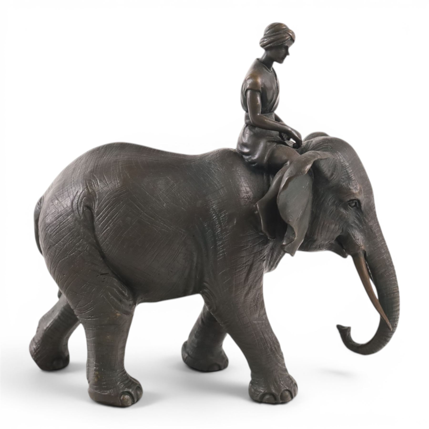 Bronzed figure of an Indian Elephant with rider, H24cm