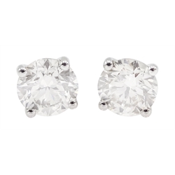 Pair of 18ct white gold round brilliant cut diamond stud earrings, stamped 750, total diamond weight approx 1.30 carat