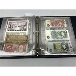 World banknotes, including Queen Elizabeth II The States of Jersey one pound 'DB202703', five pounds 'BB527762' and ten pounds 'AB651481', reserve bank of New Zealand two dollars '1L3 741894', King George V Straits Settlements one dollar 1st January 1935 'F/83 28924', various Bank of England notes etc, housed in two ring binder albums