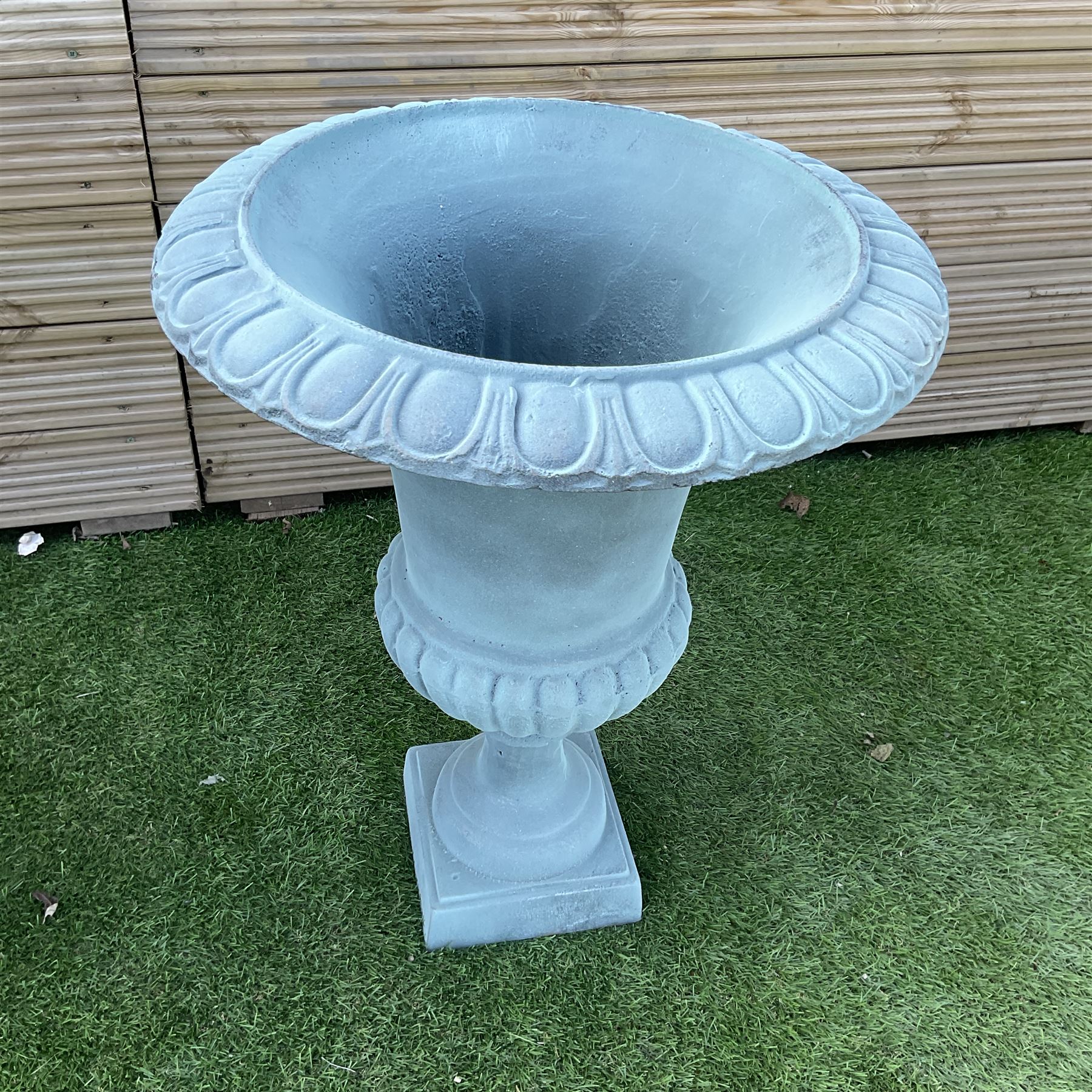 Pair of Victorian design painted cast iron garden urns, egg and dart rim, tapering column on pedestal base H63, D48 - THIS LOT IS TO BE COLLECTED BY APPOINTMENT FROM DUGGLEBY STORAGE, GREAT HILL, EASTFIELD, SCARBOROUGH, YO11 3TX