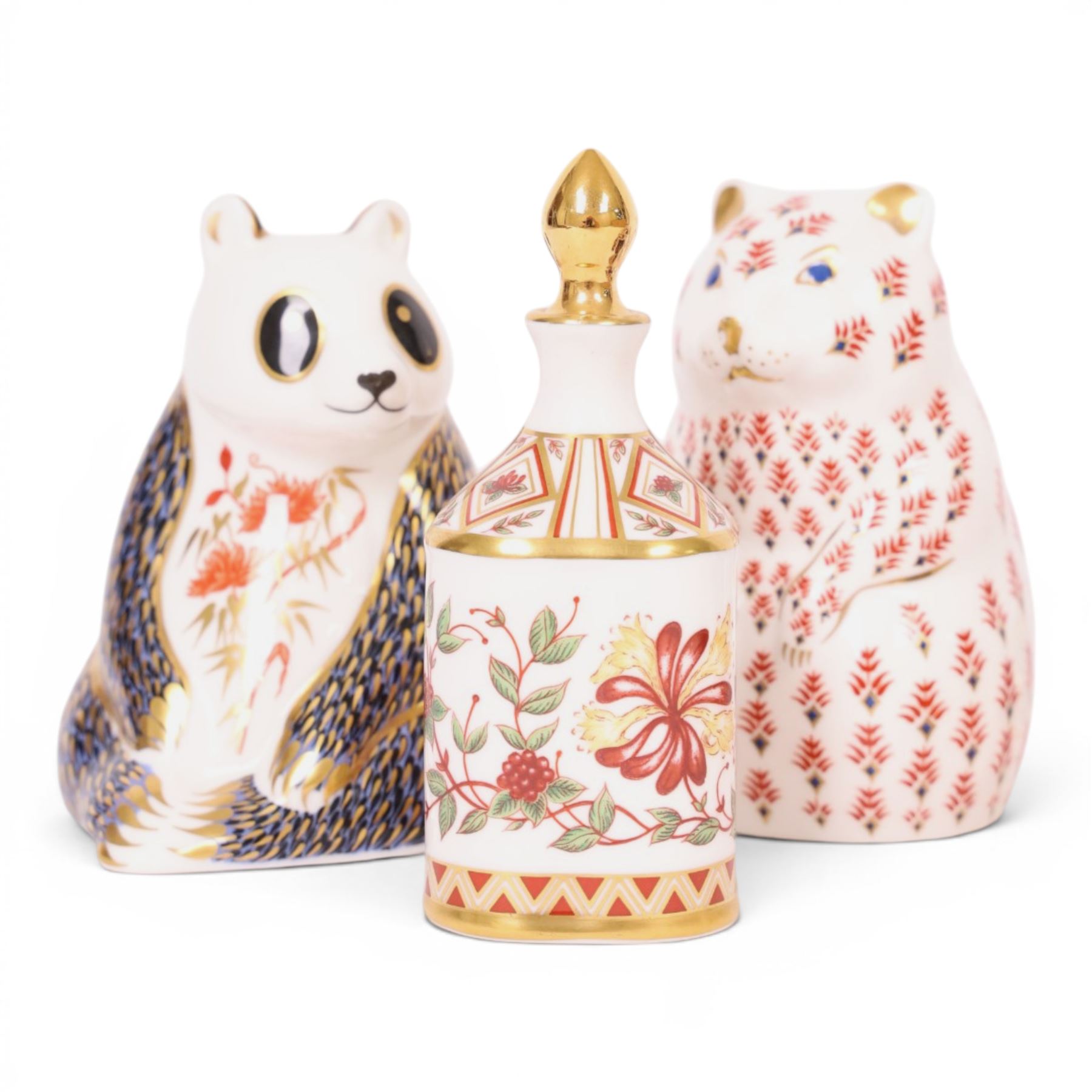 Six Royal Crown Derby paperweights, including Panda gold stopper, hamster silver stopper, Frog gold stopper etc, together with  Royal Crown Derby Honeysuckle scent bottle 