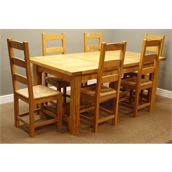  Rectangular ash dining table on stretcher base (180cm x 100cm, H78cm), and set six light oak ladder back dining chairs with rush seats  