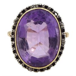 Early 20th century gold single stone oval amethyst ring