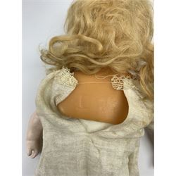 Early 20th century Cuno and Otto Dressel wax shoulder head doll with applied hair and fixed glass eyes, soft body with jointed composition lower limbs, maker's stamp to right thigh, clothing and box H38cm in original box