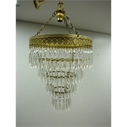  Two gilt metal centre light fittings with cut glass drops, H65cm max  