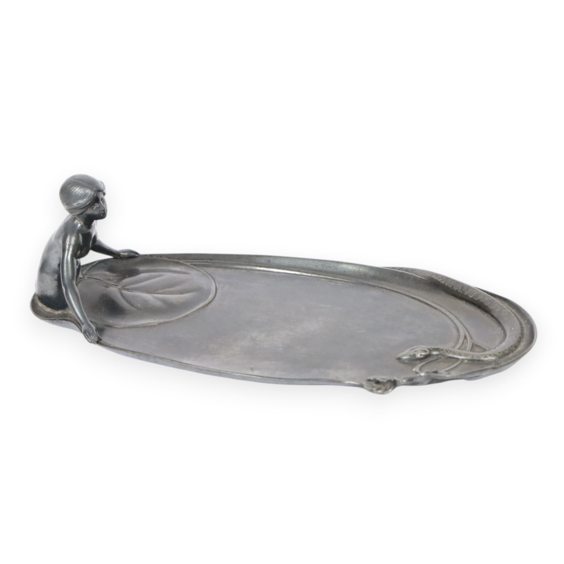 WMF Art Nouveau pewter tray, of oval from, with a female figure covered with a lily pad at one end, and snake with flowers and whiplash stems at other, signed and impressed marks beneath, H8cm, L25cm 