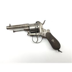 Mid-19th century 12mm (approx. .45cal.) six-shot pin fire revolver with single and double action, bears English proof marks, rifled barrel, fitted ejector rod and chequered walnut split grips L25cm