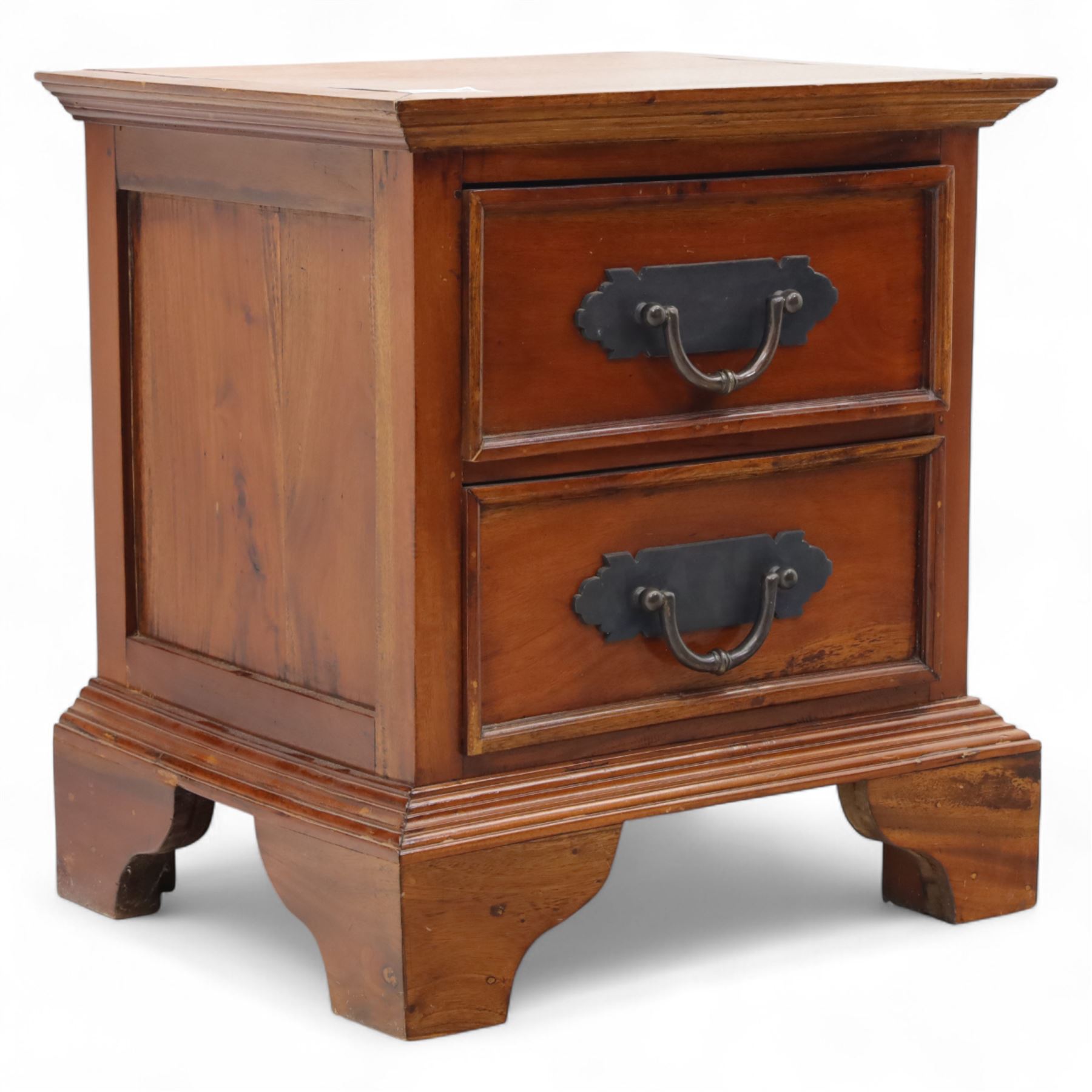 Singapore hardwood bedside chest, rectangular moulded top above two drawers fitted with metal plate handles, on shaped bracket feet
