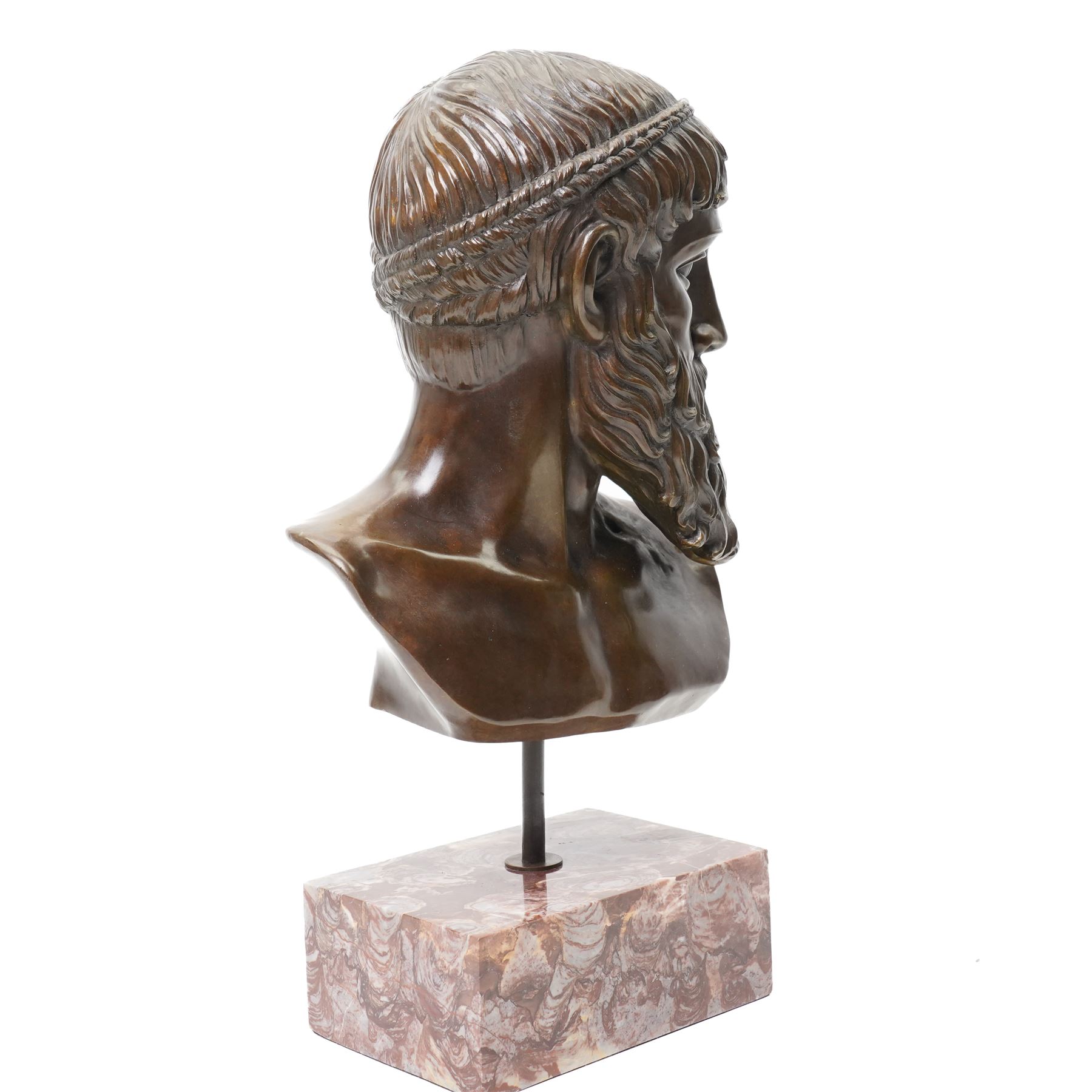 After the antique – a bronze bust modelled on the Artemision Bronze depicting the Greek god Zeus, the bearded head with intense gaze and idealised Classical features, raised on a marble plinth, H49cm Notes: the original is now held at the Archaeological Museum of Athens after being recovered from the sea off Cape Artemision