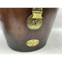 Early 20th century black silk top hat by Woodrow of Manchester and London, with manufacturer's stamp to the silk lined interior, housed in fitted tan leather hat box with removable internal compartments with straps, brass escutcheon and engraved plaque, hat internal measurements approx 20cm x 15cm