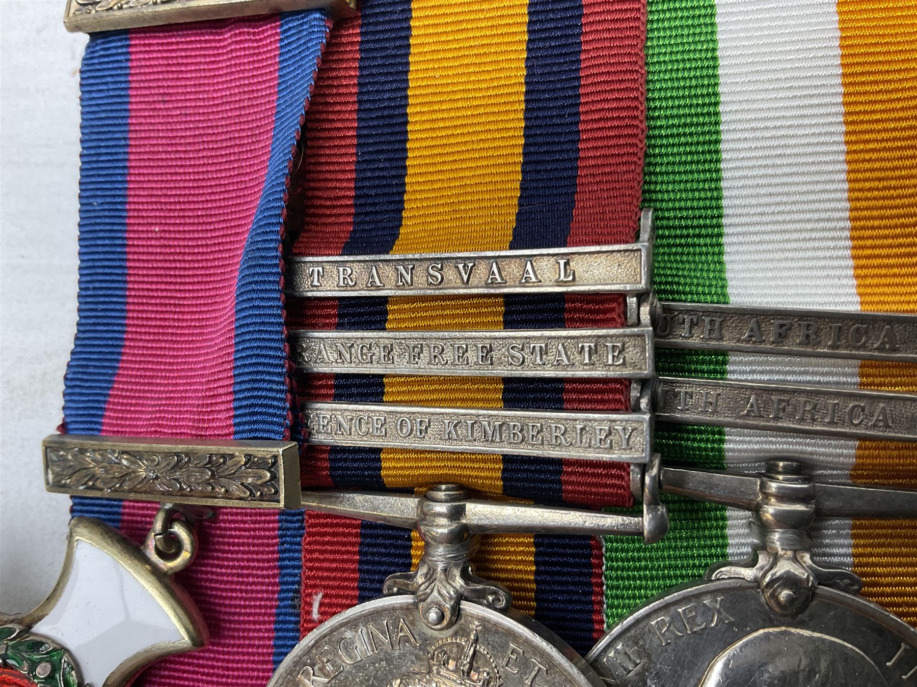 South Africa/WW1 Distinguished Service Order group of seven medals comprising D.S,O. with original ribbon bar and top bar slider, Queens South Africa Medal with three clasps for Defence of Kimberley, Orange Free State and Transvaal, Kings South Africa Medal with two clasps for South Africa 1901 & 1902 awarded to Capt. C.J. O'Gorman D.S.O. R.A.M.C., 1914-15 Star, British War Medal and Victory Medal with MID oak leaves awarded to Major (later Lt. Col.) C.J. O'Gorman D.S.O. R.A.M.C. and Kimberley Star 1899-1900; together with copies of research and biographical material