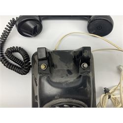 Black Bakelite telephone with rotary dial 