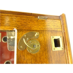  1930's 'Playball' amusement pinball coin repeat wall machine, in oak case, Patent no. 438 597, H63cm x W46cm x D18cm   