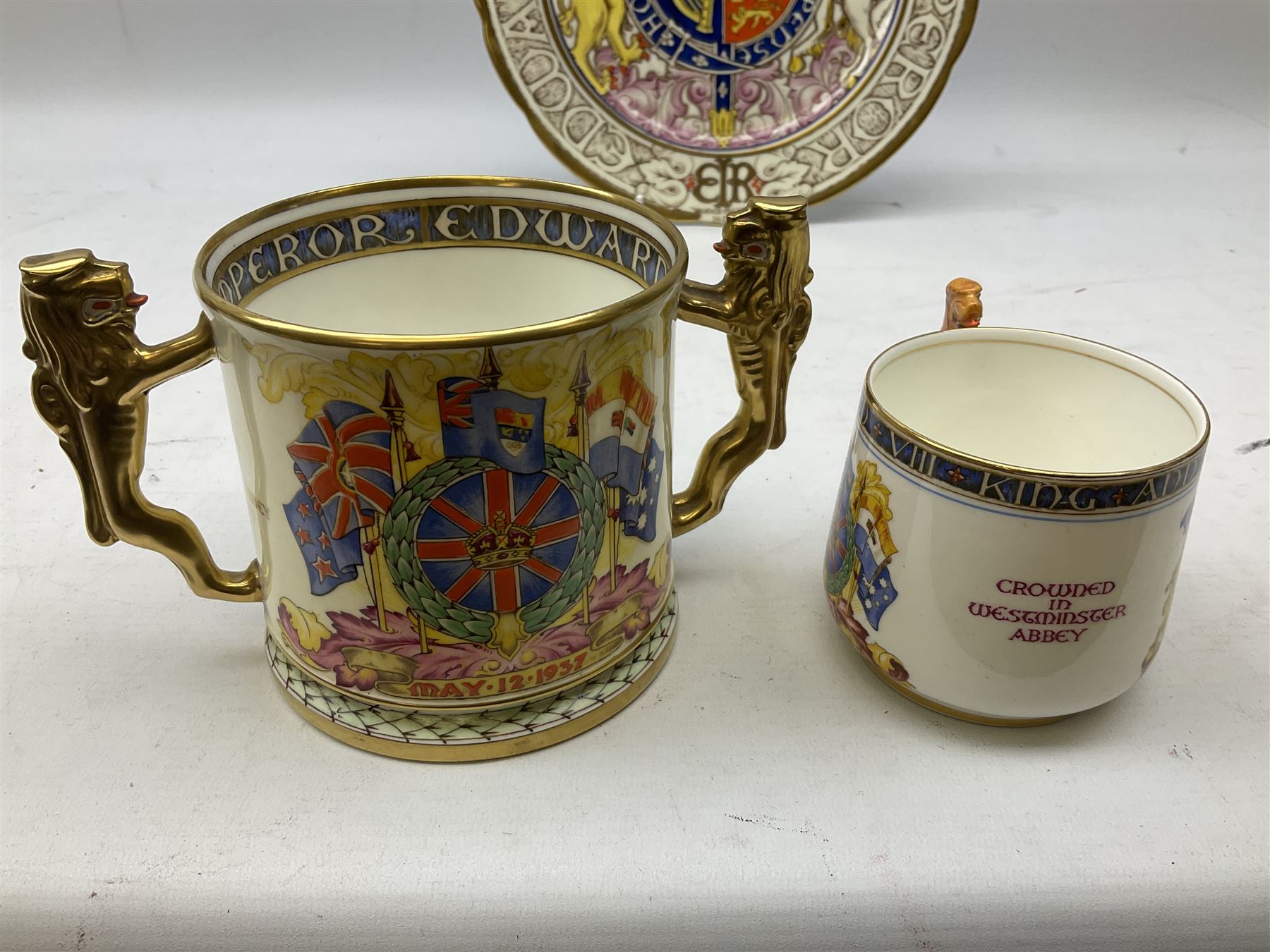 Paragon Edward VIII Coronation commemorative ware to include twin handled loving cup, H10.5cm, cup and plate, all with printed marks beneath (3)