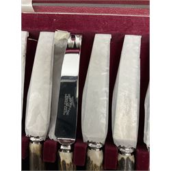 Cased set of stag horn antler knives and forks by Cooper Bros & Sons