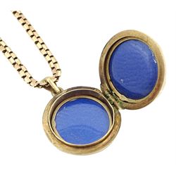 Gold circular locket with engraved decoration, on gold chain necklace, both hallmarked 9ct