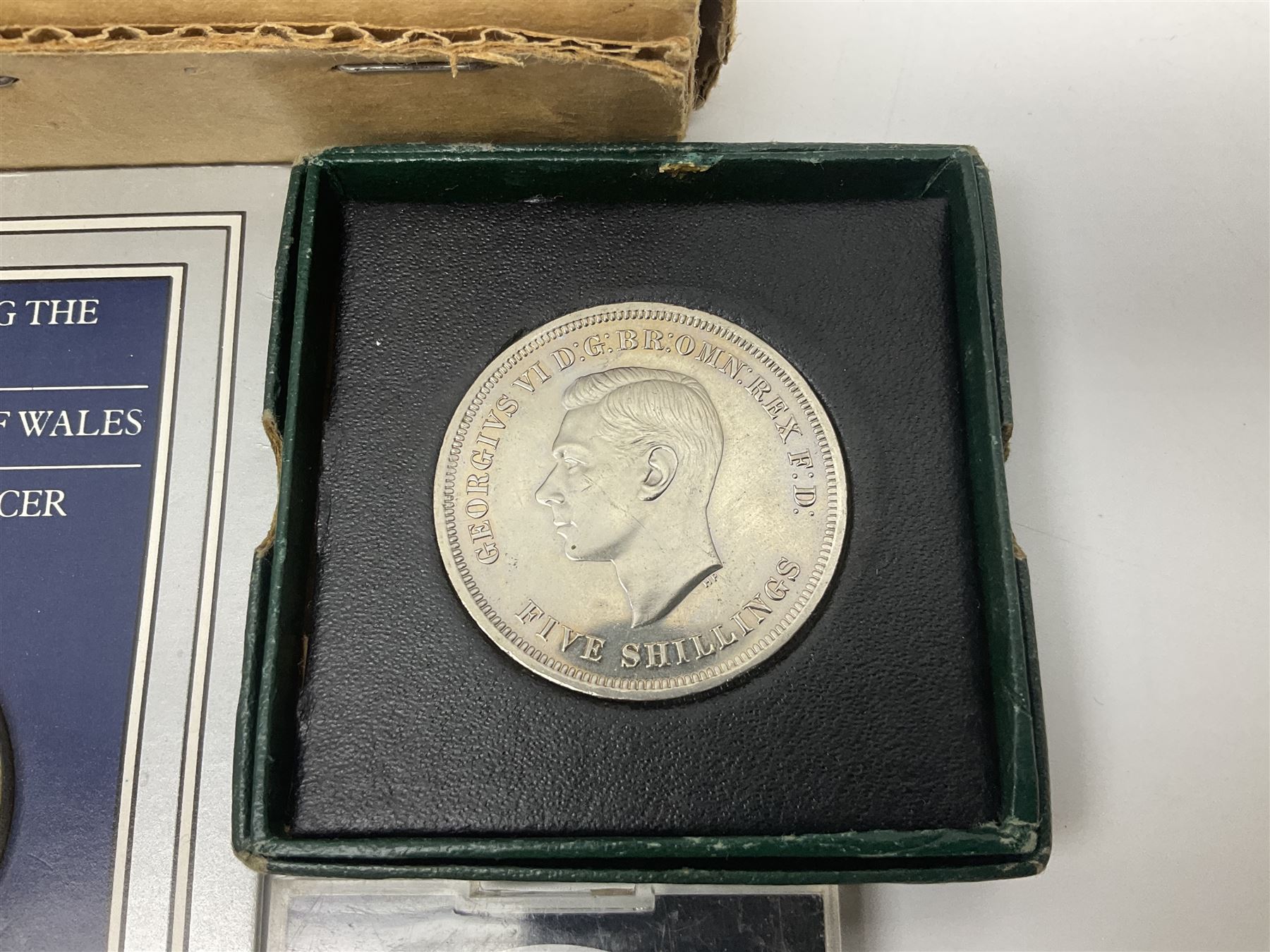 Coins including two King George VI 1951 Festival of Britain crowns each in green case, various other commemorative crowns, two Iceland '874-1974' two coin sets both in original red cases etc