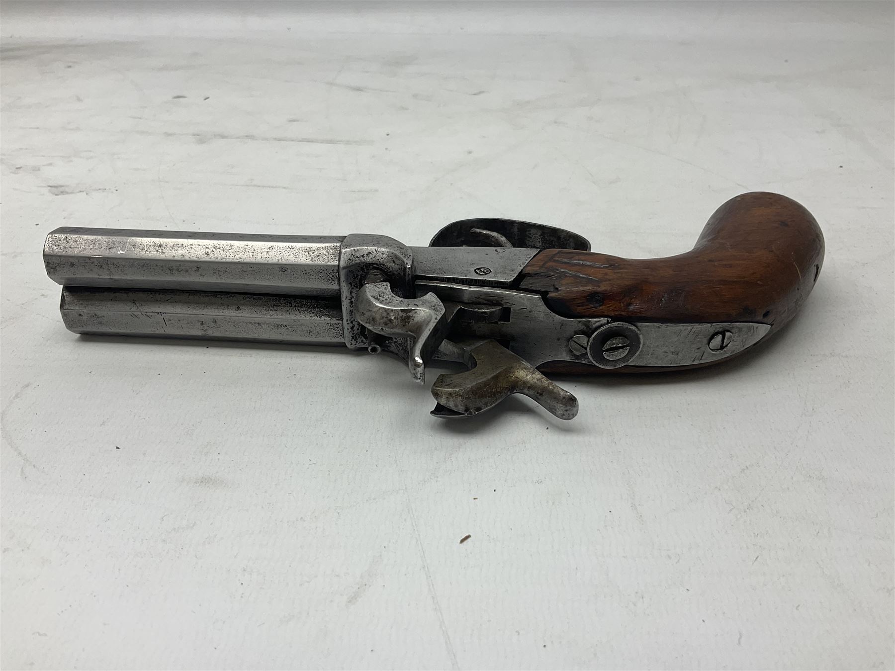 19th century Belgian double barrel side by side percussion pistol, approximately 40 calibre, with 8cm octagonal barrels, and wooden stock L22cm