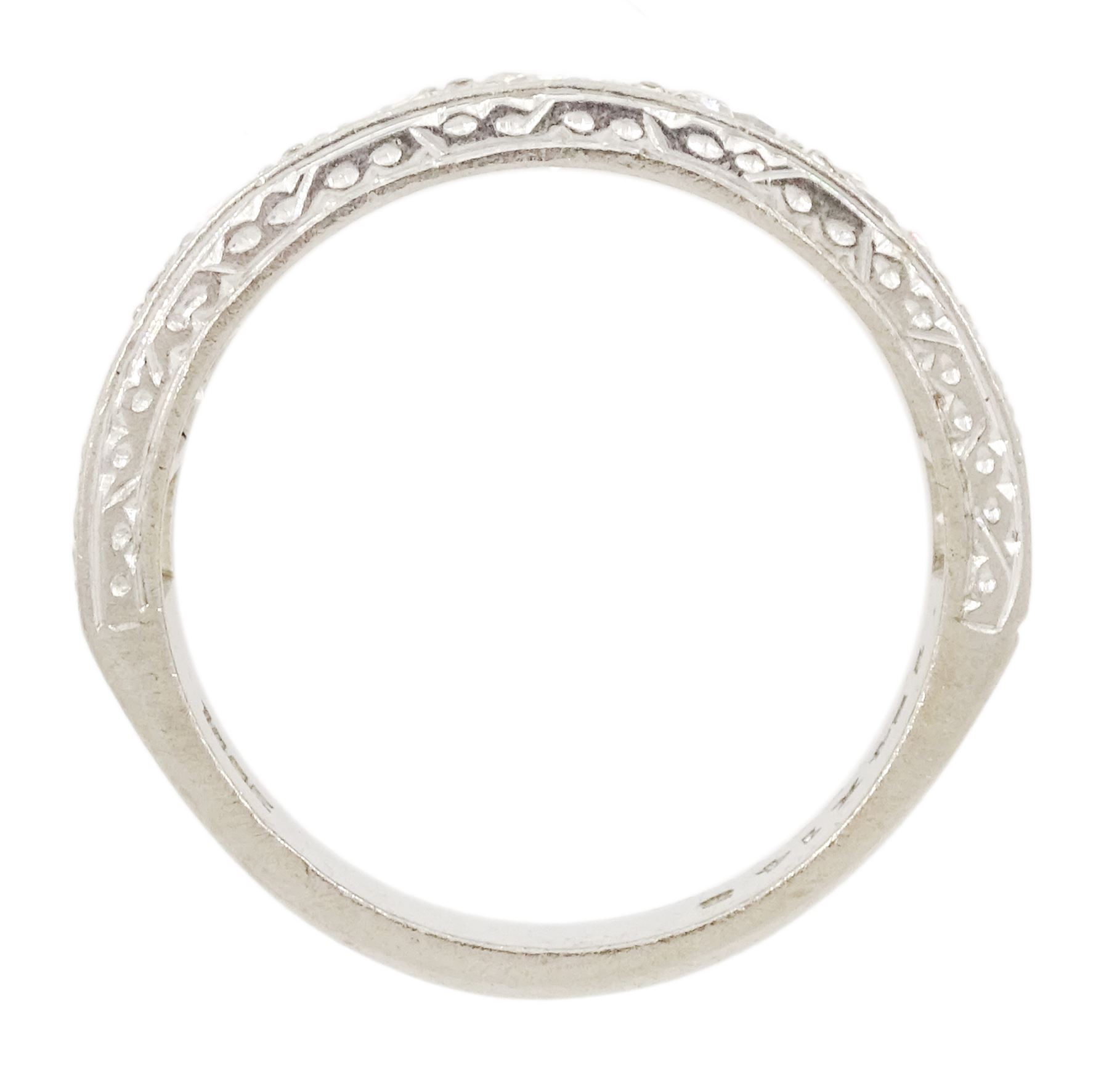 White gold seven stone round brilliant cut diamond ring, the sides with engraved decoration, stamped 18ct, total diamond weight approx 1.15 carat