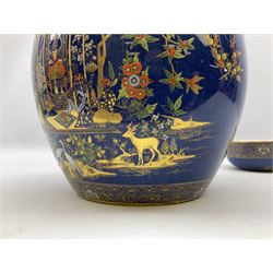Carlton Ware Persian pattern ginger jar and cover decorated with an enamel and gilt Chinoiserie landscape with figures beside a pagoda upon a blue ground, with printed mark beneath, H27cm
