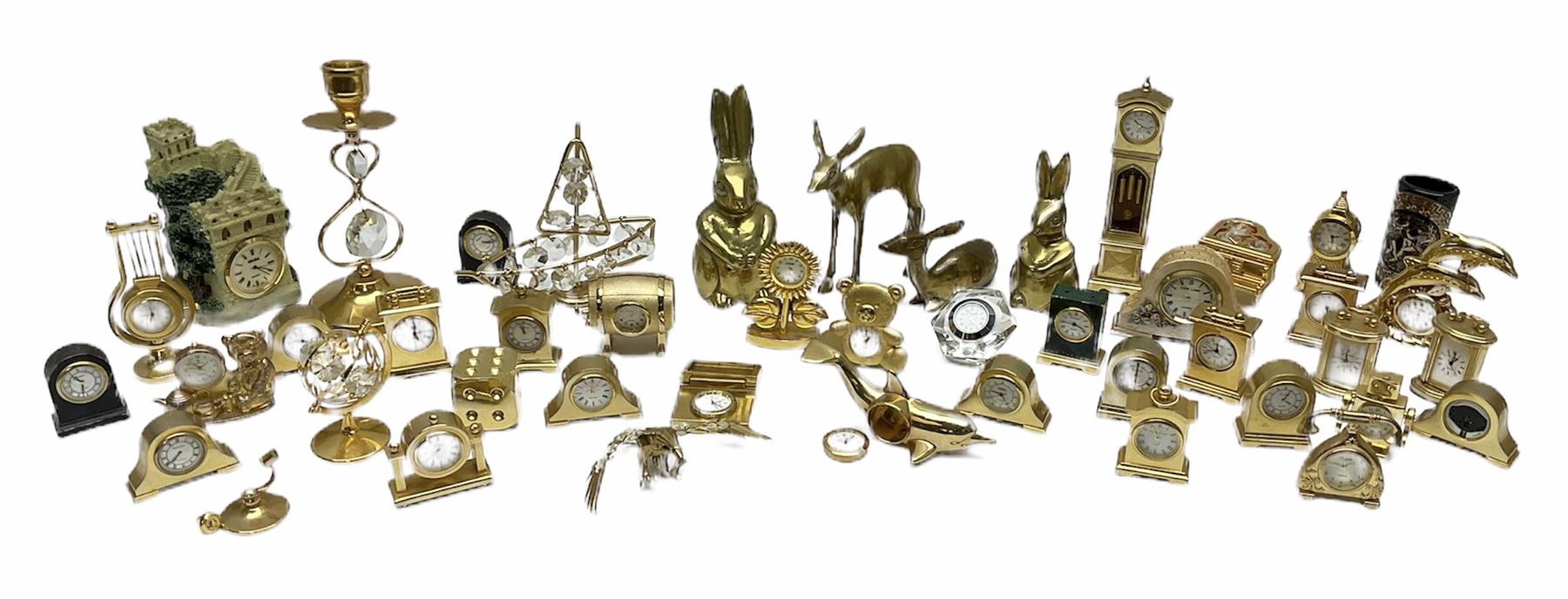 Collection of brass miniature clocks to include examples modelled as