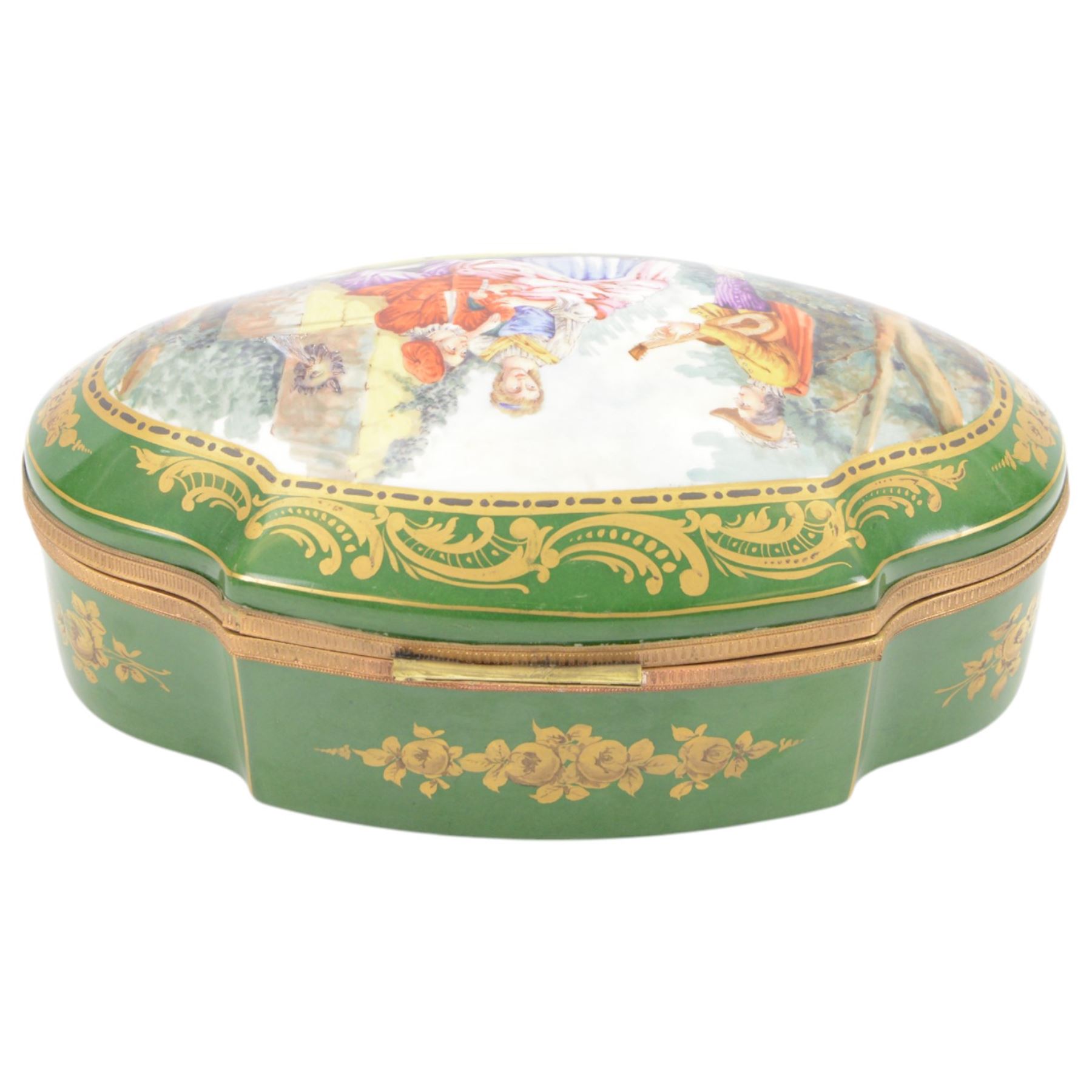 French bombee casket, Sevres style, painted with floral sprays inside gilt frames on a a green ground the cover decorated with a courting couple, signed Poirson, H18cm