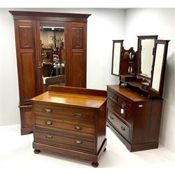 Edwardian walnut three piece bedroom suite comprising of a wardrobe with projecting cornice, single bevel edge mirrored door above drawer, shaped plinth base (W129cm, H204cm, D52cm) a raised mirror back dressing chest with six graduating drawers, shaped plinth base (W160cm, H171cm, D48cm) and a chest of drawers, raised shaped back, three drawers, shaped plinth base (W101cm, H93cm, D51cm)
