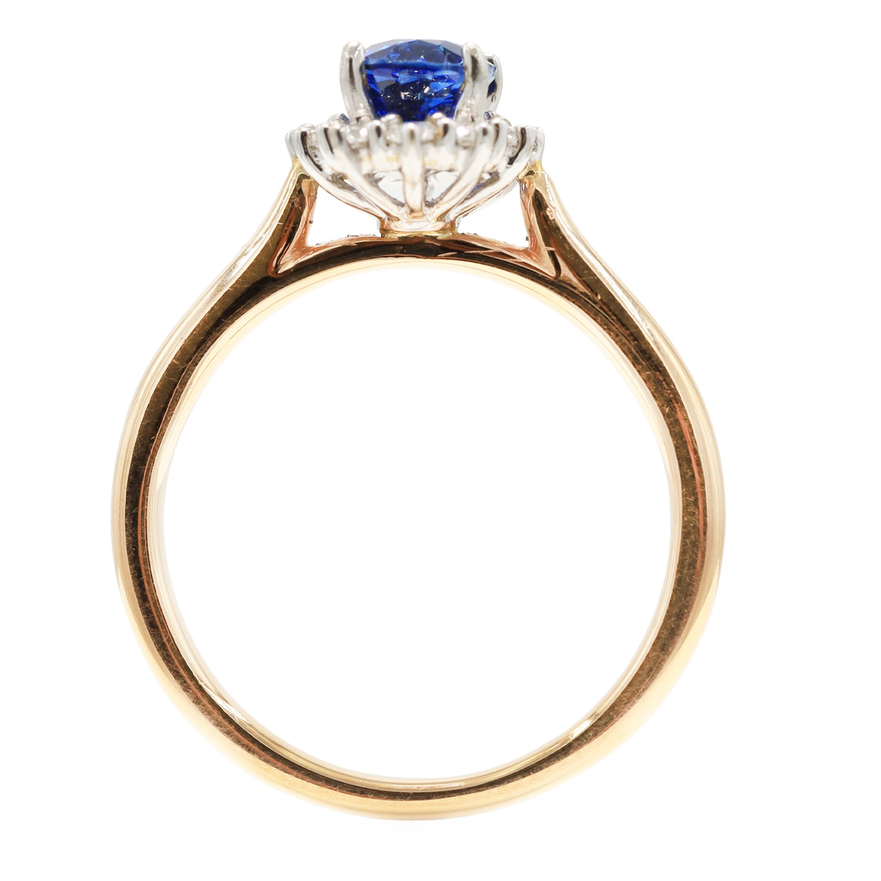 18ct rose gold sapphire and diamond cluster ring, single oval cut sapphire of approx 1.25 carat, with round brilliant cut diamond surround, hallmarked, total diamond weight approx 0.25 carat