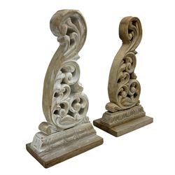 Pair of carved beech table end supports, s-scroll form pierced and carved with scrolls and foliage