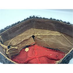 WW2 German small size Balkan style hat with 'SS' metal badges; red cloth top and flash to front with black persianelle type sides; lined in brown card with leather sweatband