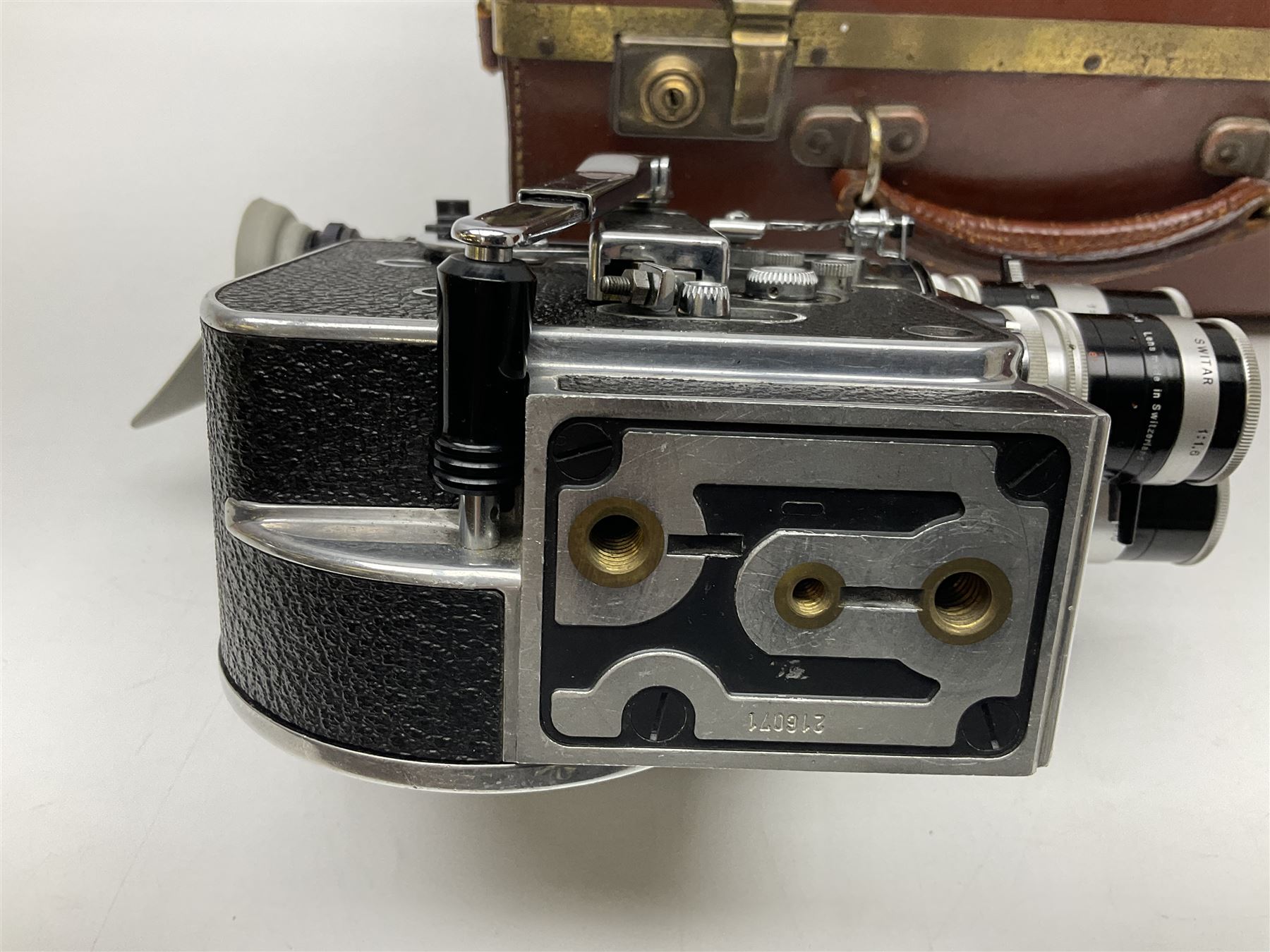 Paillard Bolex H8 RX4 cine camera body with turret for interchangeable lenses, serial no. 216071, with 'Macro Switar H8RX f1.4 36mm' lens, serial no.863406, 'Macro Switar H8RX f1.3 12.5mm' lens, serial no. 865770, 'Switar H8RX f1.6 5.5mm' lens, serial no. 937691 and RX fader, in fitted leather case