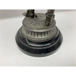 Spelter figure modeled as Cavalier with a raised sword, upon a circular base, H52cm
