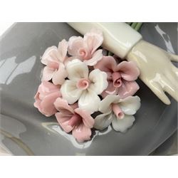 Four Lladro figures, comprising Afternoon Promenade no 7636, Nostalgia no 5071, both with original boxes, Girl with Lilies no 4972 and Madonna no 4534, largest example H27cm